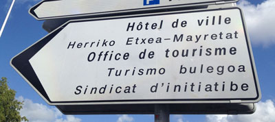 Road sign in Bayonne; trilingual in French, Basque, and Gascon Occitan